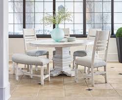 The taryn round table is a modern interpretation of classic farmhouse style that lights up any room. Condesa White Round Dining Room Table Chairs And Bench By Elements