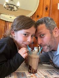 Jim and his beautiful daughter 🌸 Lila sharing chocolate milk before  breakfast. Yummy 😋 Jill Malamut, a great mortgage lender!!