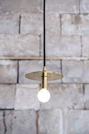 Streamlined Light Designs By Lambert Fils Of Montreal Remodelista Lighting Inspiration Cool Lighting Brass Pendant Light