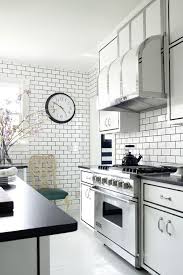 White quartz kitchen countertop with gray accents creates a clean line. 33 Subway Tile Backsplashes Stylish Subway Tile Ideas For Kitchens