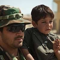 Iraqi police recruits stand tall and proud in formation