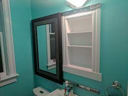 I Made A Recessed Medicine Cabinet Hidden Behind A Sliding Mirror Idea Stolen From U Z Bathroom Mirrors Diy Bathroom Mirror Makeover Recessed Medicine Cabinet