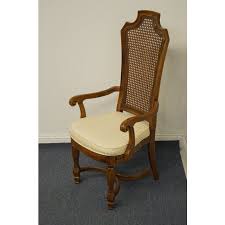 Set of six vintage thomasville dining chairs feature cane backs and faux bamboo detailing. Thomasville Furniture Legacy Collection Cane Back Dining Arm Chair 7821 884 Chairish