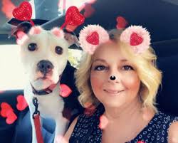 Bella loves the ride to work.