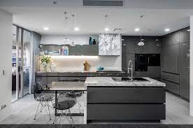 This kitchen designer used a light grey shaker cabinet design for a subtle pop of contrast against the shimmery white herringbone backsplash. 20 Range Hood Design Ideas For Your Modern Kitchen Home Design Lover
