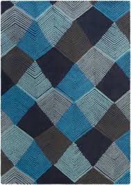 A muted gold settee with a nostalgic silhouette would look perfect atop a floor covering like this. Harlequin Rug At Rug Studio