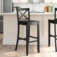 It is functional, comfortable and decorative. Copper Grove Frunza Black X Back Bar Stool Single