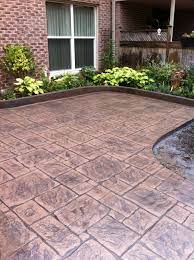 Can get you the product you need, when you need it! English Yorkstone Stamped Concrete Patio With Stone Block Stamped Concrete Curbs In London Ontario Patio Stamped Concrete Patio Concrete Patio Designs