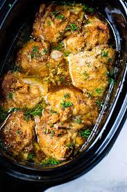 The combination of sweet, garlicky and savory seasoning of these crock pot chicken thighs reminds me of slow cooker teriyaki chicken thighs and slow cooker bacon wrapped chicken. Garlicky Slow Cooker Chicken Recipe Super Easy Oh Sweet Basil