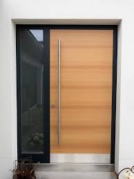 Wood Door Modern Front Doors Must Not Only Have An Appealing Appearance But Also The Most Modern Security Modern Front Door Wood Front Doors Garage Door Design