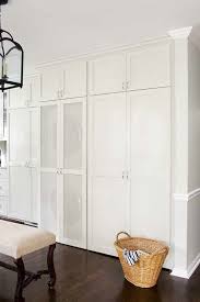 Terracotta Properties Amazing Hidden Laundry Room In Kitchen With Floor To Ceiling Cream C Hidden Laundry Hidden Laundry Rooms Small Laundry Room Organization