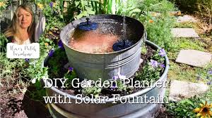 From 48 to 60 inches in height, add a charming addition of calm or bold design to your deck or garden with a new large outdoor patio fountain. How To Diy A Garden Planter With Solar Fountain Youtube