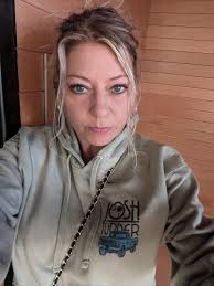 While folding a pile of shirts