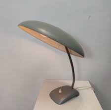 The bauhaus table lamp embodies the essential idea that form follows function, as espoused by the influential bauhaus school. Bauhaus Desk Lamp Retge