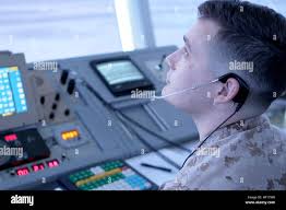 Lance Cpl. William Dickens, air traffic controller and a Sylvester, W.Va.,  native, learns the cab coordinator position at the Air Traffic Control  facility aboard Marine Corps Air Station Miramar, Calif. April 15.