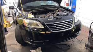 Where is the battery located on a chrysler 200. 2014 Chrysler 200 Alternator Removal Youtube