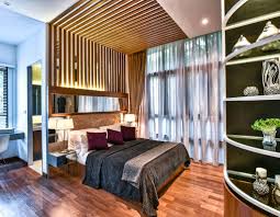 Master bedroom with modern glass fireplace. Top 10 Award Winning Interior Design Malaysia By Latitude Design Latitude Design Sdn Bhd