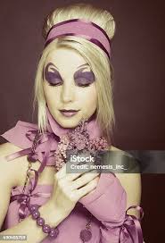 Girl In Violet Stock Photo