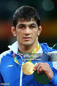 Cuba's Yowlys Bonne Rodriguez wrestles with Senegal's Adama Diatta in...  News Photo