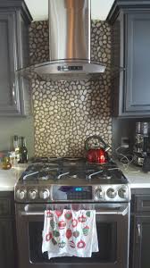 Select one of our backsplash designs to learn which backsplash tiles and trim pieces are used, and more about each of the materials. 120 Backsplash Ideas Pebble And Stone Tile Backsplash Pebble Tile Stone Tiles