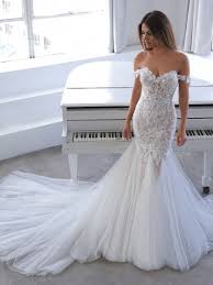 We have hundreds of wedding and bridesmaids' dresses for you to try in our beautifully spacious edinburgh store, as well as comfortable changing rooms with an area for friends and family to sit and offer their opinions. Modern Wedding Dresses Blue By Enzoani Enzoani Enzoani