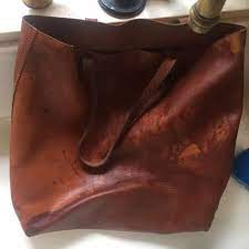 How To Fix A Water Stain On Leather Wonder If It Works Clean Leather Purse Water Stains Leather