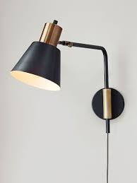 Wall sconces serve two main purposes: The Best Plug In Wall Sconces For Every Decor Style