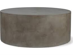 Round out your seating area with this coffee table in a contemporary round design. Seasonal Living Perpetual Slate Gray Concrete Grand Louie 41 Wide Round Coffee Table Sea501ft128p2g