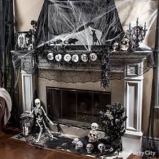 Consider, how many real pumpkins will you need? Hair Raising Halloween Mantel Decorating Ideas Party City Halloween Fireplace Halloween Decorations Gothic Halloween