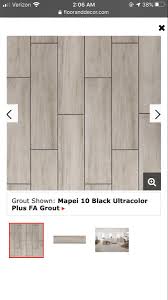 Check out this grill master's tile transformation! Carson Gray Wood Plank Ceramic Tile Grey Wood Wood Planks Ceramic Tiles