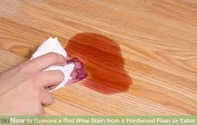 Start by blotting as much spilled wine as possible, even standing on absorbent cloths if necessary. How To Remove A Red Wine Stain From A Hardwood Floor Or Table Red Wine Stains Wine Stains Red Wine Stain Removal