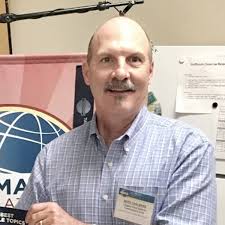 TREASURER MARK CHALMERS