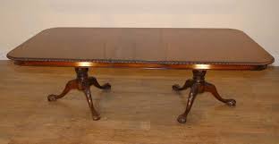 Whether you prefer something traditional or transitional, the dining table set of your dreams is within your grasp. English Carved Mahogany Chippendale Victorian Dining Table
