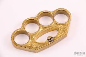 We carry real italian stilettos, cheap stiletto knives, butterfly knives, push button automatics, side opening automatic knives, switchblade knives, brass knuckles and hunting knives. Engraved Brass Knuckles Arizona Custom Knives