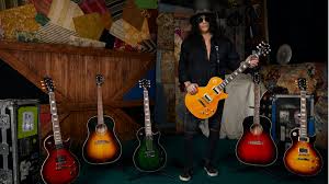Official, exclusive merchandise, unique items and much official slash merchandise including apparel, collectibles, tour merch and more. Namm 2020 Gibson Unveils Gigantic Slash Collection Of Les Pauls And Acoustics Guitar World