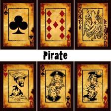 Print out some photographs on photo paper at the same size as a deck of playing cards you want to customize. Custom Playing Cards
