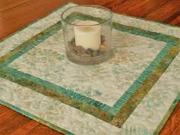 Quilted Square Table Topper In Botanical Batik Prints Aqua Green And White With Ferns And Leaves Quilted Tab In 2020 Quilted Table Runners Table Toppers Square Quilt