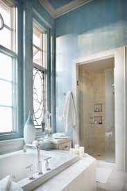 This eclectic space sees the innovative use of white subway tiles on the wall. Selling Or Renovating Blue Bathrooms Like These Sell For More Bucks