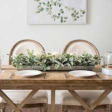 For more centerpiece inspiration, check out these posts below: Green Eucalyptus Galvanized Centerpiece Kirklands