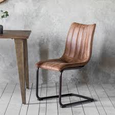Measure the height of your dining table from the ground to the tabletop to get a rough idea of how much space you have to work with. Edington Chair Dining Chairs Leather Dining Chairs