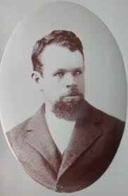 John Ensign Woolley (1852-1912)