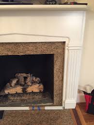 Remove your old surround to get the space ready for a surround that better complements the room. Ugly Granite Fireplace Surround
