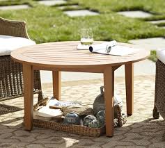 Christopher knight home 304396 ishtar outdoor acacia wood coffee table, teak finish/rustic metal description: Hampstead Teak Round Coffee Table Pottery Barn