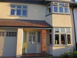 Very practical and long lasting, ral 7032 wood paint is fade resistant and conveniently disguises any dirt build up. A Home With Agate Grey Windows Exterior House Remodel 1930s House Exterior House Paint Exterior
