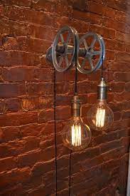 Description This Light Is Based On Our Single Wall Pulley Concept But Uses Two Steel Pulley Wheels From The Wall T Pulley Light Pulley Wall Light Swag Light