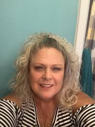 First National Bank Womens' Softball Team. Front: Sharlene Marcum, Melanie  Parker Wise,Kathy Glass Rogers, Edwina Leach, Debby Glass, Sharon Glass  Vance, Annie Stephens. Back: Dickie Rogers, Earlene Hawkins, Barbara  Towles, Lisa Baldwin,