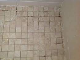 How can i remove this? Totally Renovated Bathroom Grout Has Dried Light And Dark