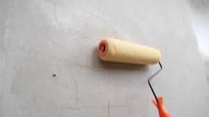 Apply a second coat if needed and allow to dry. Paint Primer Concrete Wall With Stock Footage Video 100 Royalty Free 1015103542 Shutterstock