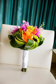 Our oahu bridal bouquets, maile leis and wedding florals are created by the best oahu florist and are hand made pieces of art. Tropical Wedding At Hyatt Regency Grand Cypress Fl Tropical Wedding Bouquets Tropical Wedding Flowers Wedding Bouquets Bride