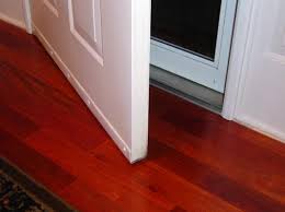 You can then cover up the gap between the threshold and the laminate flooring by installing a piece of matching quarter round to the threshold, using a clear sealer, like osi quad. Help With Front Door Threshold Pictures Diy Home Improvement Forum